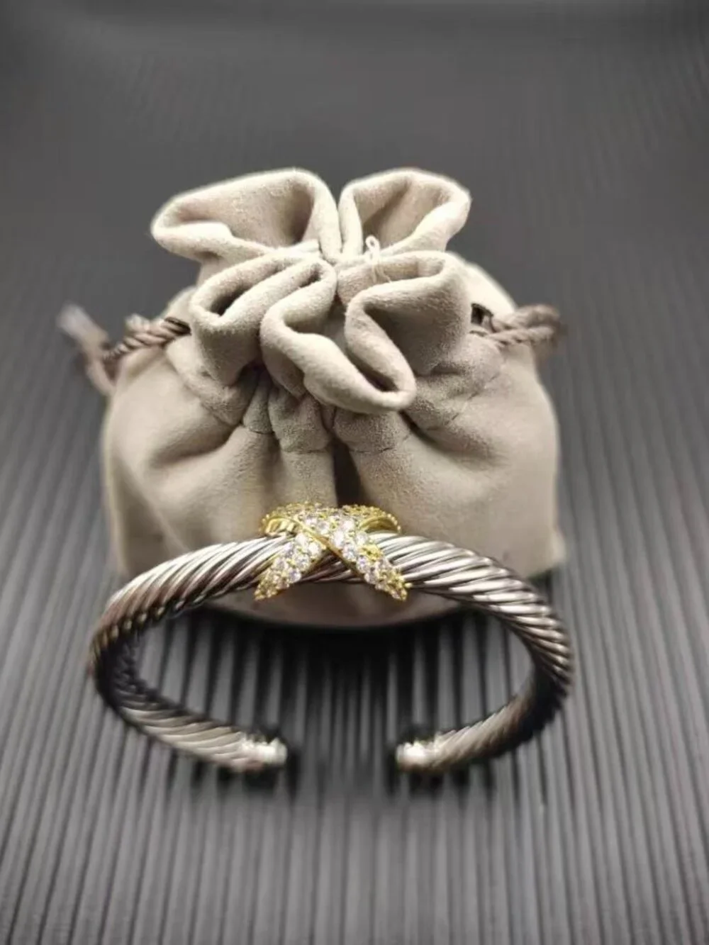 David Yurman's bracelet with a cross motif